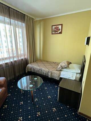 Гостиница Строитель Сыктывкар Номер стандарт с 1 односпальной кроватью-1